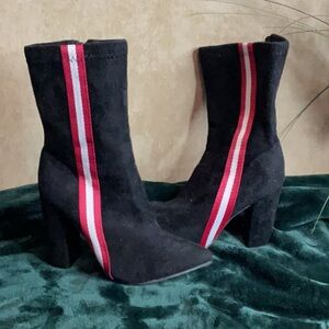 Black boots with red & white stripes